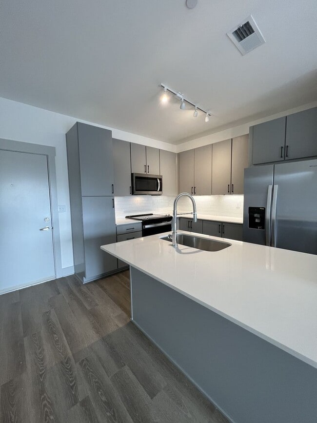 Building Photo - Top floor WEHO condo in new development