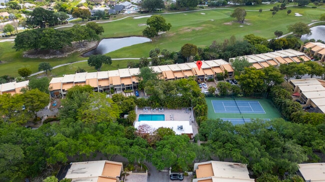 Building Photo - 720 E Coco Plum Cir