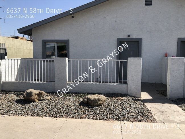 Building Photo - 6637 N 58th Dr