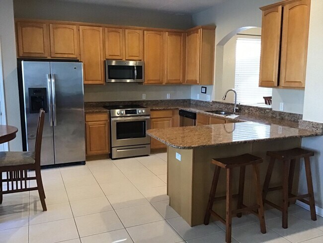 Building Photo - Furnished 6 bedroom, 4 bathroom house, pool home in beautiful, gated/guarded Windsor Hills