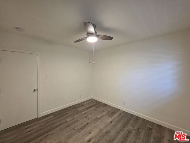 Building Photo - 10734 Palms Blvd