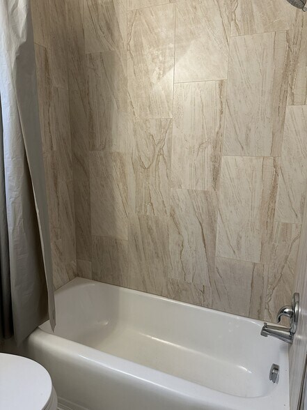 Renovated bath tub in second bathroom - 2317 Francine Rd