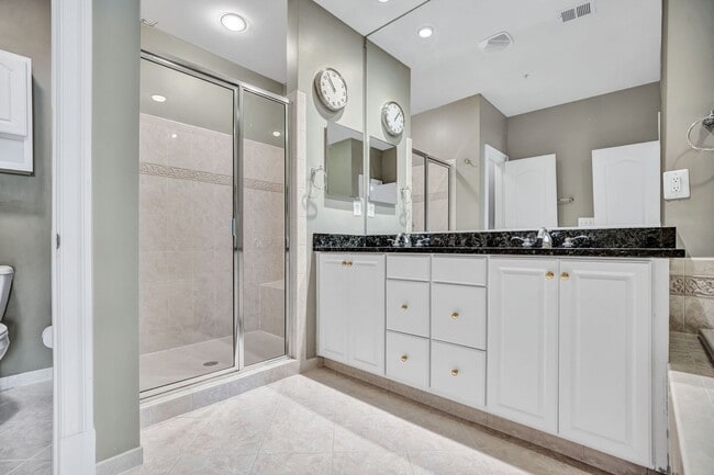 Building Photo - Stunning 4BR All-Brick End-Unit Townhome with Rooftop Terrace in Potomac Greens