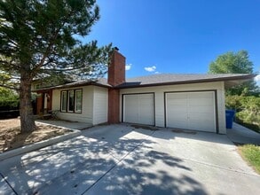 Building Photo - Expansive 5-bedroom, 2.5-bath home with incredible mountain views!