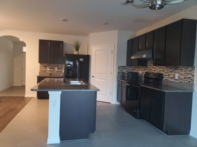 Building Photo - 6776 Wagon Trail St