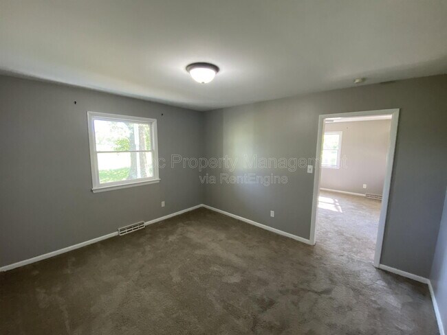 Building Photo - 10291 Paige Rd