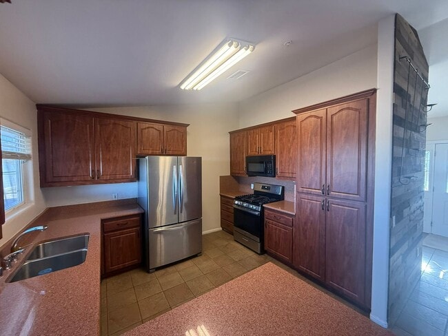 Building Photo - 4BR/2BA HOME w/ attached garage, usable land, fenced in back yard in CAMPO available!