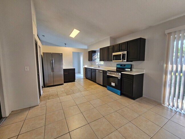 Building Photo - Completely Renovated! - Inviting 3-bedroom, 2-bath home located in the well-established Lake Spar...