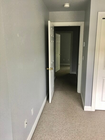 Hallway tathroom and 2nd bedroomo b - 14 Heron Cove Dr