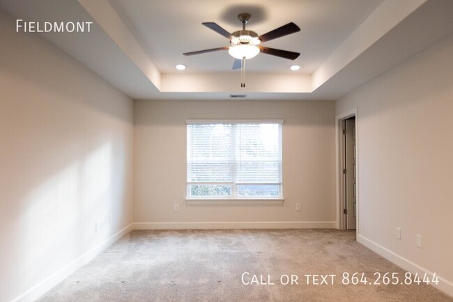 Building Photo - Like-New Townhome with a Fence & Garage!