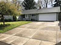 Building Photo - Stylish & Spacious 4-Bedroom Home in SE Sa...