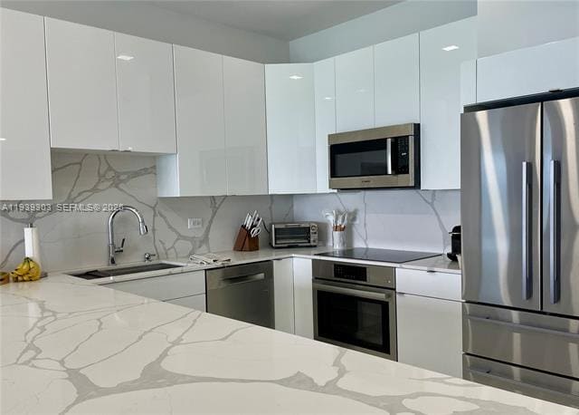 Building Photo - 5701 Collins Ave