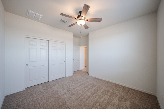 Building Photo - New 4 Bedroom + Den Home in Asante Community