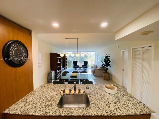 Building Photo - 10275 Collins Ave