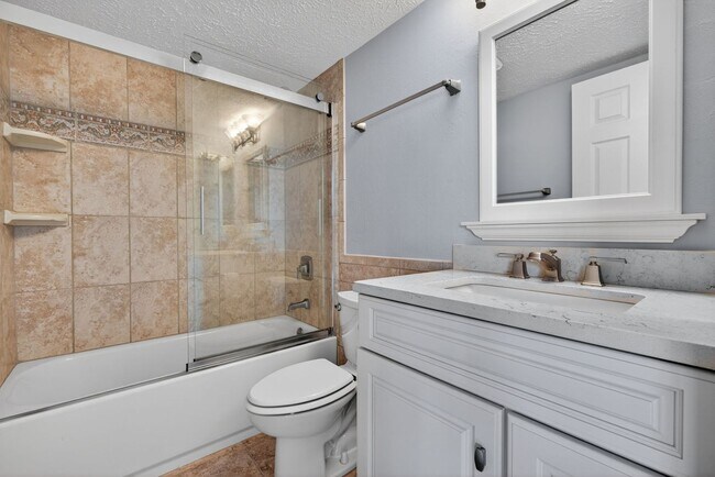 Building Photo - Gulf Access 2 bedroom 2 Bath Fully updated Condo with Water View