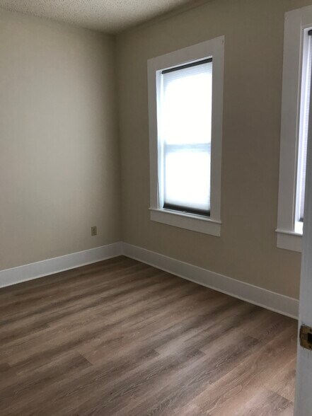 Bedroom off kitchen - 151 E Allen St