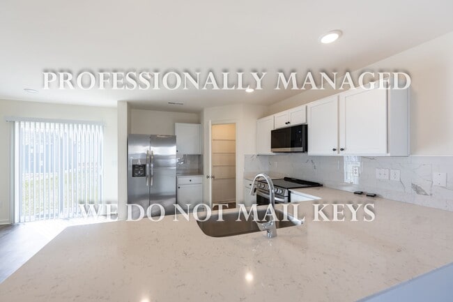 Building Photo - 7009 Peppermill Way