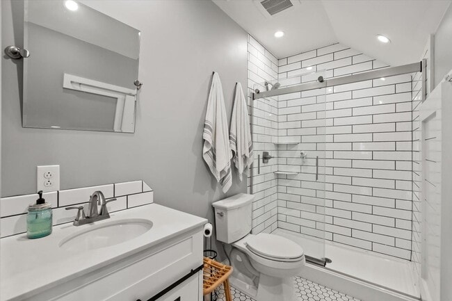 Building Photo - unning custom-built home on a full acre in...