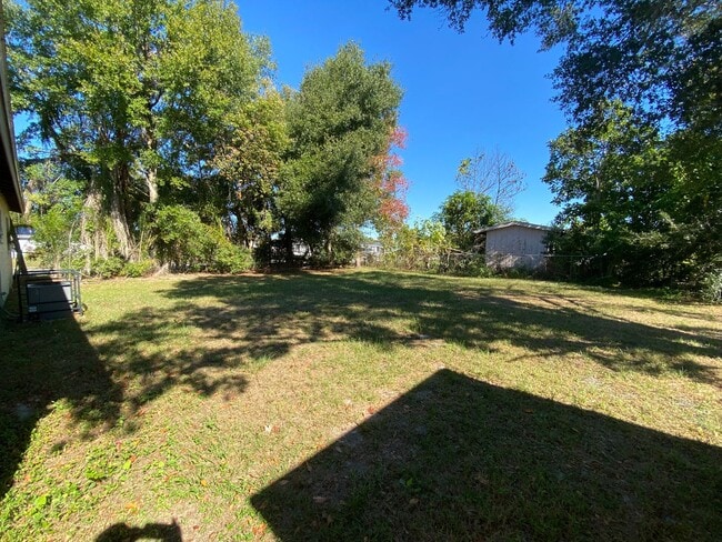 Building Photo - Corner Lot  Home with Oversized, Fenced Back Yard