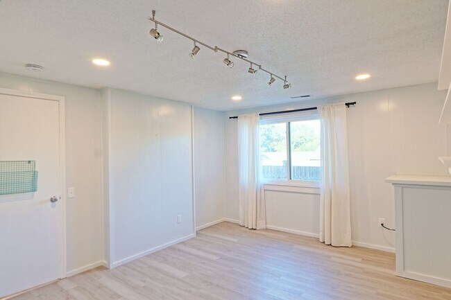 Building Photo - Spacious 3-Bedroom Attached Villa with Finished Basement & Private Fenced Yard!