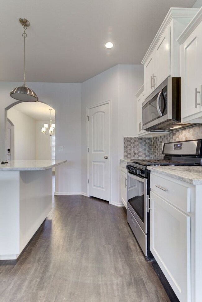 Building Photo - Pool + Park Community! 3/2/2 Plus Office!