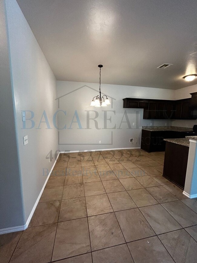 Building Photo - 3BR 2BA duplex with 2 car garage in Yukon!!