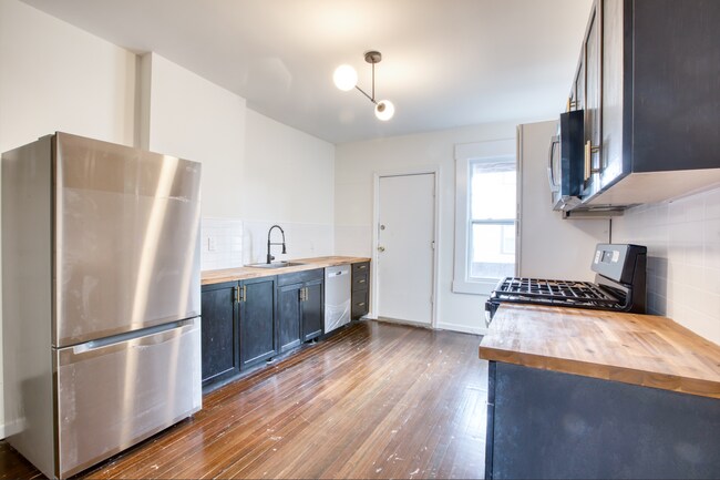 Building Photo - 49-51 Kibbe St - Unit 202