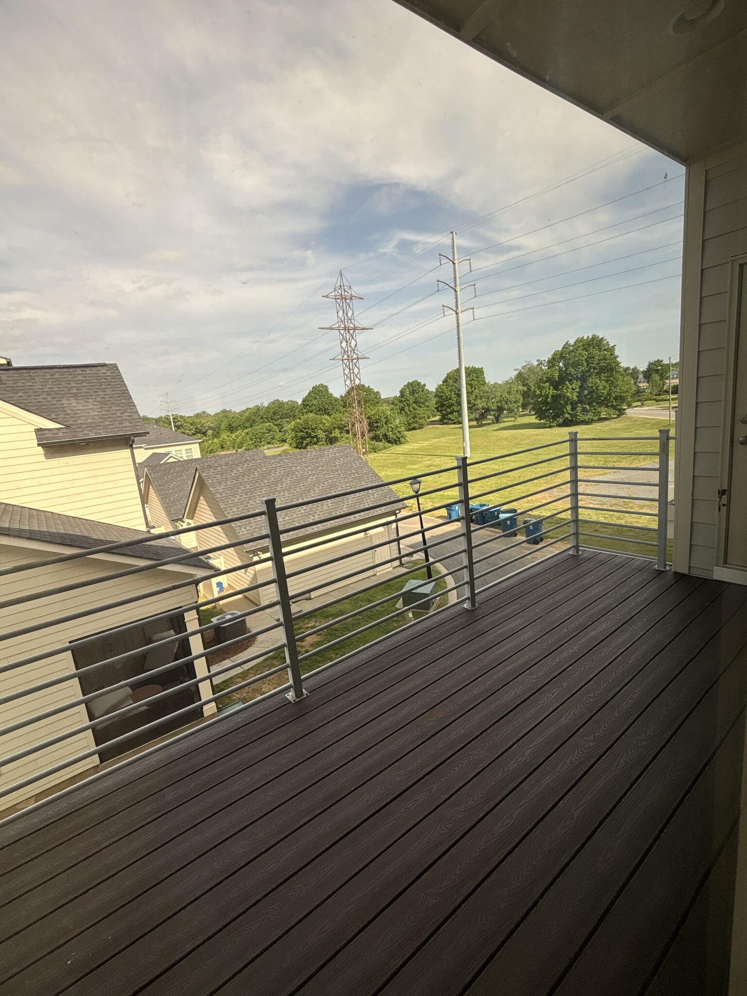 Patio with open views of easement area - 2631 Statesville Ave