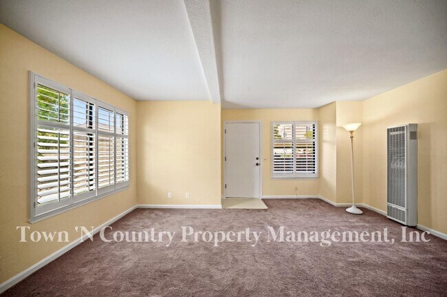 Building Photo - Now Available in Monterey’s Sun Belt | Stylish Updated Condo in a Prime Location Just Reduced to ...