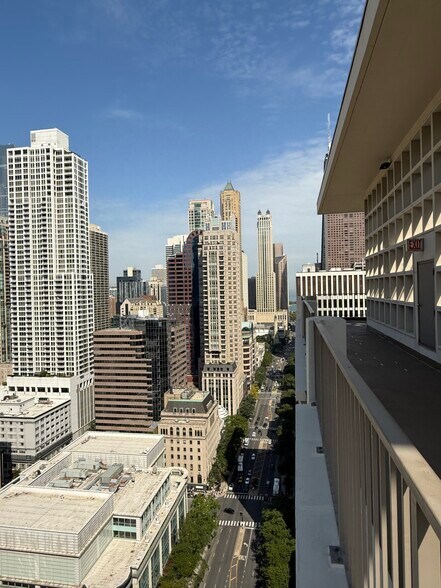Enjoy panoramic Michigan Avenue views from the rooftop deck - 535 N Michigan Ave