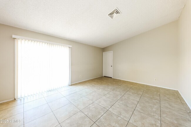 Building Photo - 10831 West Campbell Ave