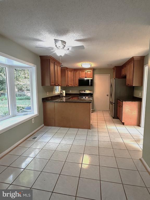 Building Photo - 9612 Whitecedar Ct