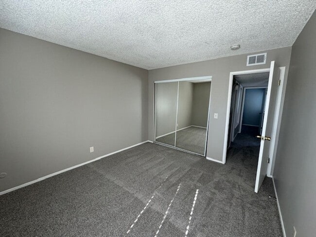 Building Photo - Fully Remodeled 3 Bedroom Townhome Available Soon!