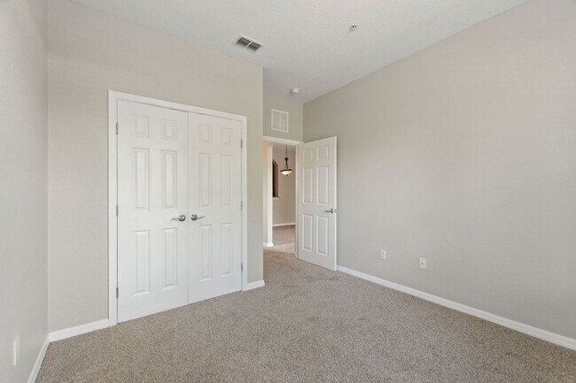 Building Photo - First floor condo in Champions Gate! Ready...