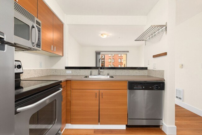Building Photo - Modern Cap Hill 1 Bedroom with Garage Parking & Laundry Room