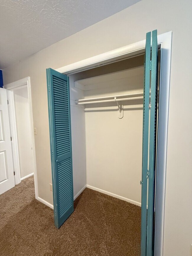 Building Photo - Spacious Comfort Meets Practical Living in...