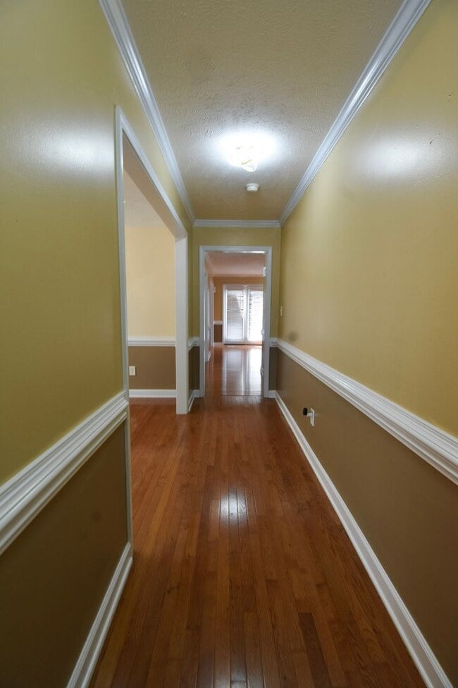 Building Photo - Coming Soon!! 4 Bedroom 2.5 Bath Nicely Renovated with Updated Fixtures! - No Pets