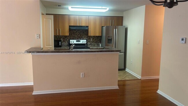 Building Photo - 6020 W Sample Rd