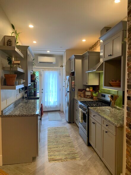 Dishwasher, gas range and stove, chefs sink, stainless steal fridge with ice and spacious pantry - 53 Broadway
