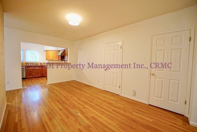 Building Photo - Modern Ground Floor Condo with 2 Car Garage!