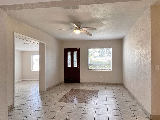 Building Photo - Three-Bedroom Home with Spacious Family Bo...