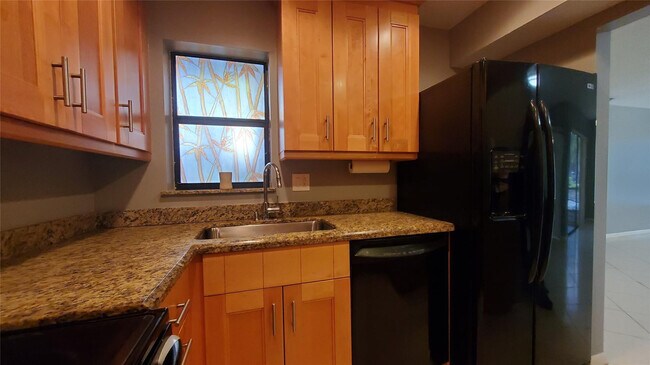 Building Photo - 3831 Cocoplum Cir