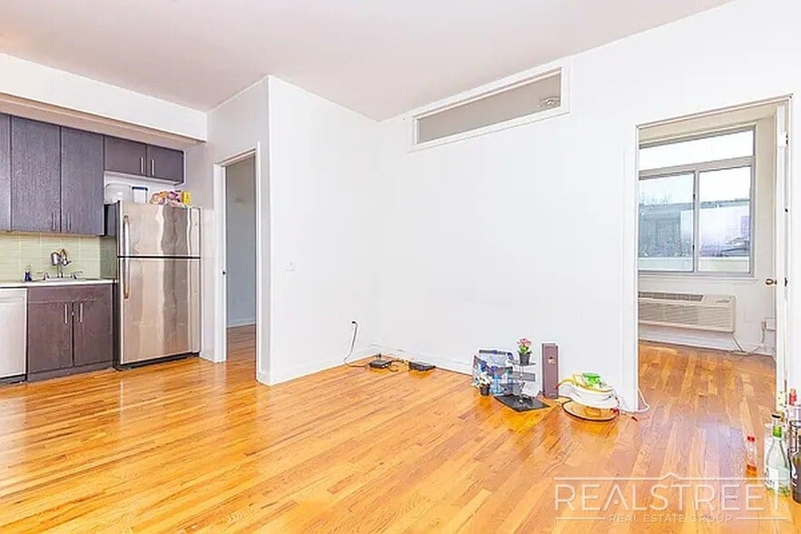 Building Photo - Massive Outdoor Patio | Spacious 3BR/2BA Apartment in Bushwick–East Williamsburg