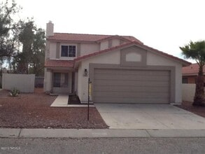 Building Photo - Convenient Northwest 4 Bedroom 3 Bath with Use of Community Pools