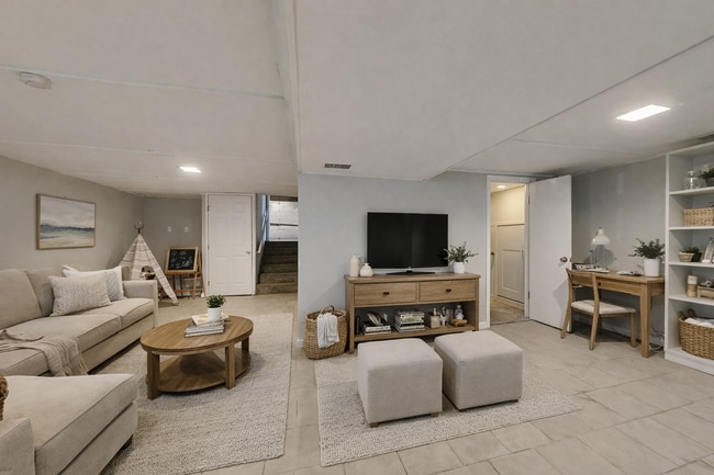 Building Photo - Spacious 4BR Home with Finished Basement, Fireplace & Unique Layout