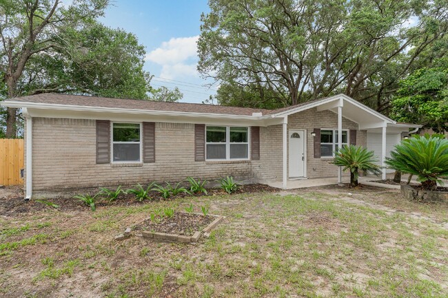 Primary Photo - "Spacious 4-Bedroom, 2-Bath Home with Fenc...