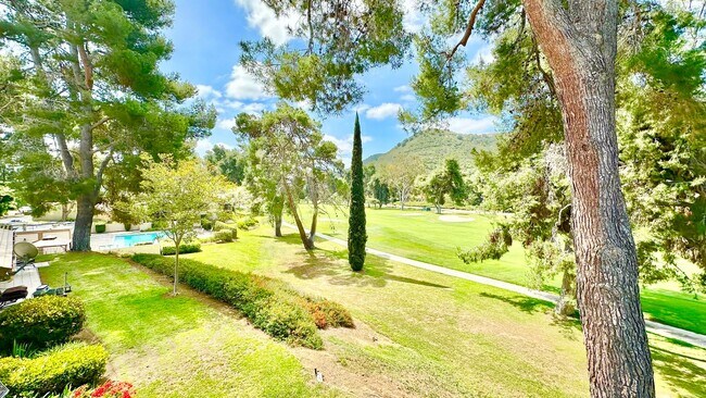 Building Photo - Fully Remodeled Upper Unit Condo in the De...