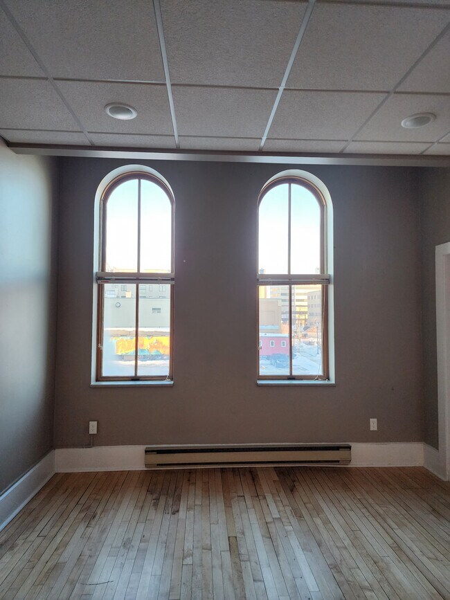Beautiful windows let in abundant natural light. - 604 Main Ave