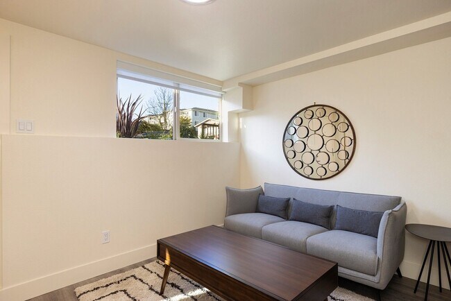 Building Photo - Ballard Gem! Updated Apartment w/ Parking, Bright Interiors & Steps to Dining + Parks