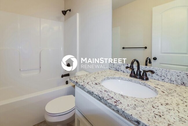 Building Photo - 4 Bedroom Pet-Friendly Home in Raymore, MO...